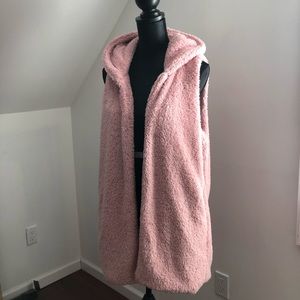 Pink fuzzy, hooded vest.